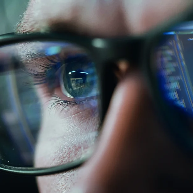 1355638834 Close-up Portrait of Software Engineer Working on Computer, Line of Code Reflecting in Glasses. Developer Working on Innovative e-Commerce Application using Machine Learning, AI Algorithm, Big Data