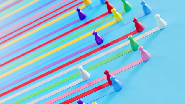 Das Bild zeigt mehrere bunte Spielfiguren, die einen Regenbogen bilden.