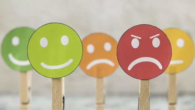 The picture shows faces with different emotions.