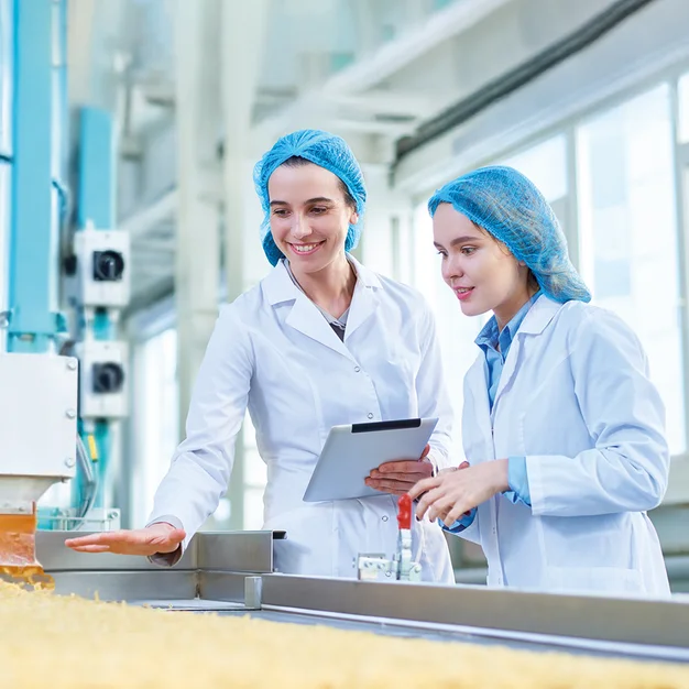 Students inspect pasta production line