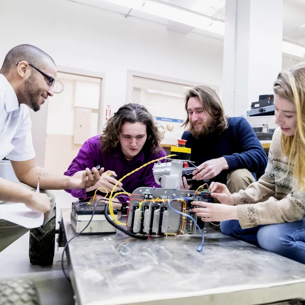Group of Students working on their engineering project Group of Students working on their engineering project