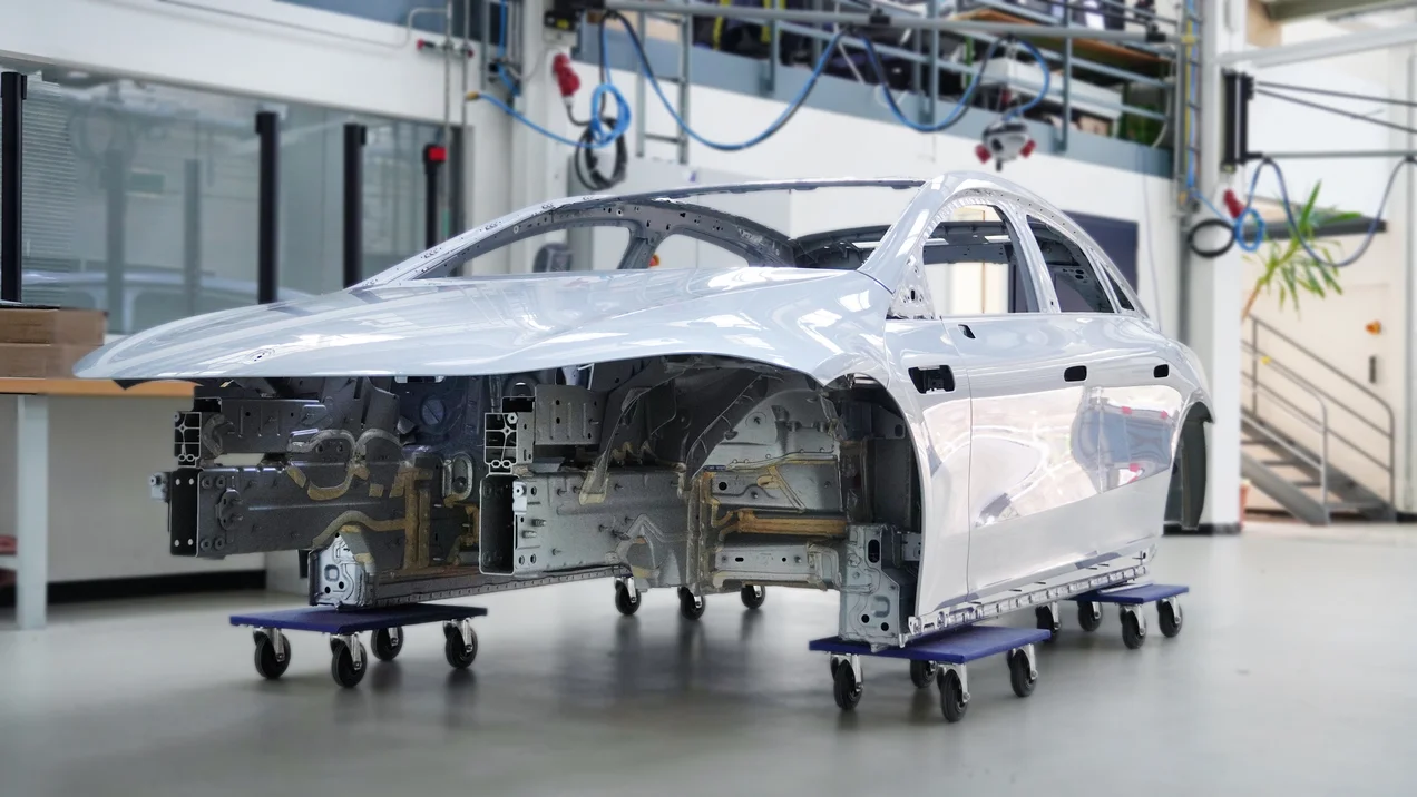 silver car model without engine and tires