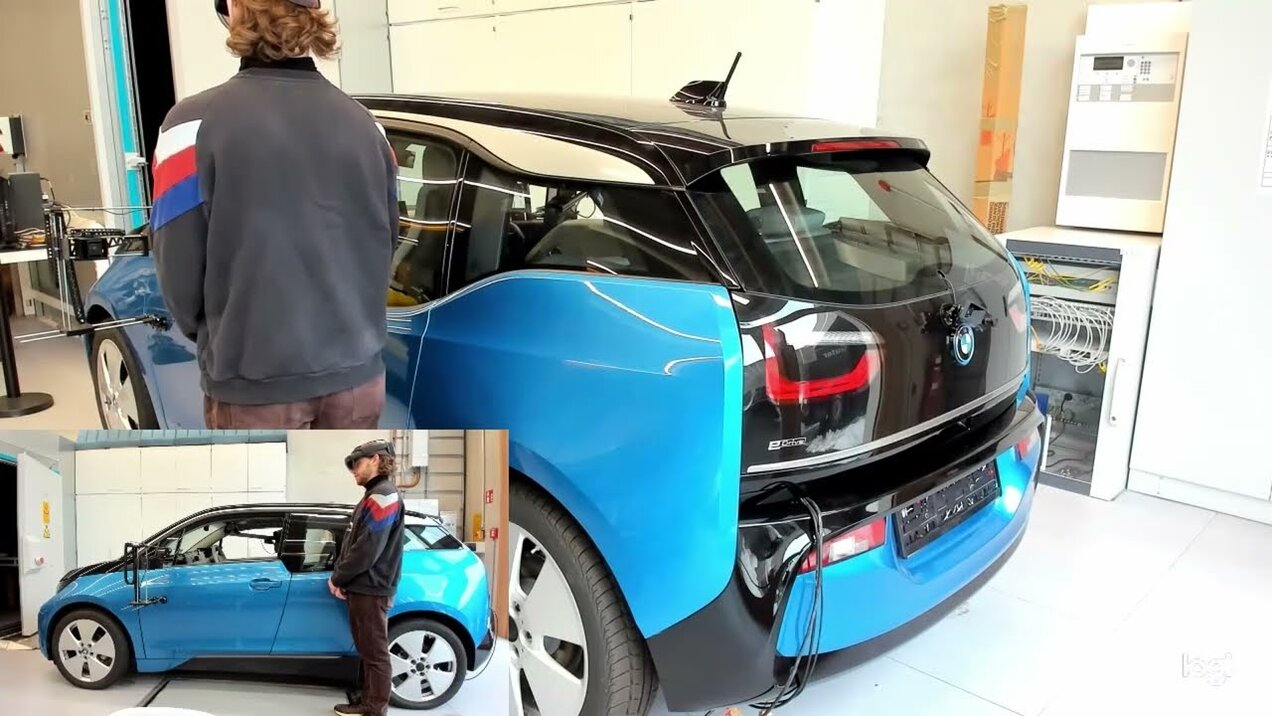 DiLa Ambient View. A student uses DiLa's digital interface in AR mode in front of a car